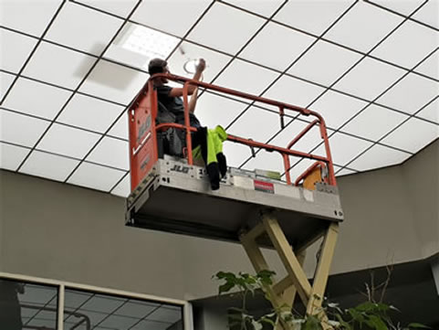 Accessing LED Light fittings with Scissor Lift - EWP
